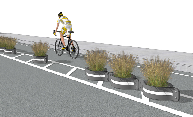 Image of person on a bike riding on a bike path