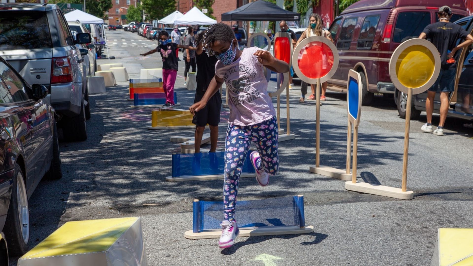young kids playing in the street